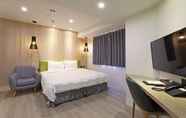 Kamar Tidur 4 Green Hotel - West District