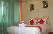 ห้องนอน 5 Simply Homy Guesthouse Graha Puspa