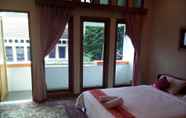 Bedroom 6 Simply Homy Guesthouse Graha Puspa