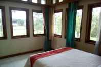 Bedroom Simply Homy Guesthouse Graha Puspa