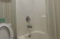 In-room Bathroom Travelodge by Wyndham Orangeburg