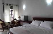 Kamar Tidur 2 Ella Grand Peak Hotel