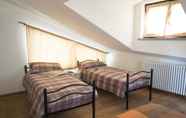 ห้องนอน 5 Residenza Le Marmotte