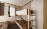 Kamar Tidur 5 Rainbow Pines Tourist Caravan Park