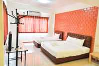 Kamar Tidur Budsarakam Place Hotel