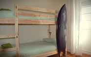 Kamar Tidur 6 Green Coast Surfhouse