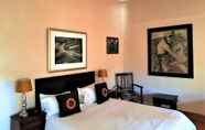 Kamar Tidur 4 African Roots Guest House