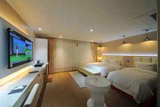 ห้องนอน 4 Biz Hotel