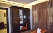 Kamar Tidur 6 Jo Carter's Hotel & Suites