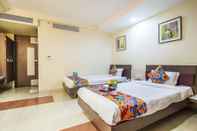 Kamar Tidur FabHotel Amrit Residency