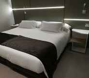Bedroom 5 Hotel Spa Ciudad de Binefar