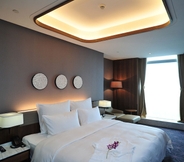 ห้องนอน 6 The Lotus Hotel Chongqing