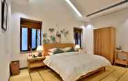 Bedroom 2 Linxi Wushan Inn