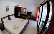 Kamar Tidur 2 Alona Vida Beach Resort