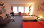 Bedroom 3 Hotel Comedie