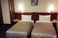 Kamar Tidur Jing Jing Holiday Hotel