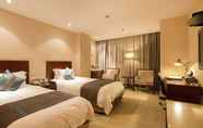 Kamar Tidur 3 Landison Plaza International Hotel Zhenjiang