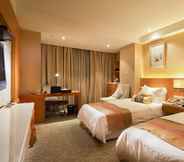 Kamar Tidur 4 Landison Plaza International Hotel Zhenjiang