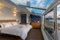 Bedroom ROOF TOP SUITE by Living Las Canteras