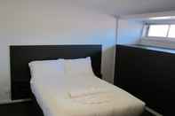 Kamar Tidur Queens Head Hotel