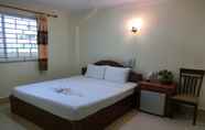 Kamar Tidur 7 First Hotel