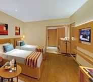 Kamar Tidur 6 Express Inn The Business Luxury Hotel