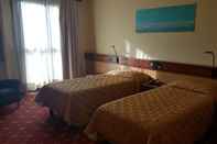 Bedroom CH Hotel Giada Inn