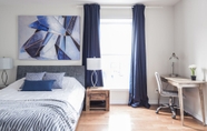 Bedroom 4 MTLVacationRentals - Suite Mont-Royal - 3 queen beds, 1,5 Ba