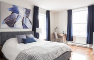 Bedroom 2 MTLVacationRentals - Suite Mont-Royal - 3 queen beds, 1,5 Ba