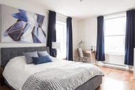 Bedroom MTLVacationRentals - Suite Mont-Royal - 3 queen beds, 1,5 Ba