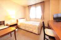 ห้องนอน Shinmatsudo Station Hotel