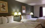 Bedroom 4 Amerihost Inn & Suites - Mexico