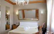 Kamar Tidur 6 Hotel & Resort Bee Queen