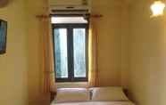 Kamar Tidur 6 Sackarinh Guesthouse