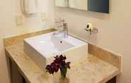 In-room Bathroom 3 Radiant 2BR PH in private location by Happy Address