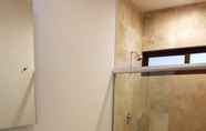 In-room Bathroom 4 Radiant 2BR PH in private location by Happy Address