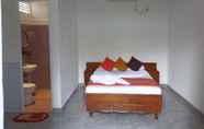 Kamar Tidur 2 Leos Home Stay