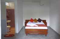 Bedroom Leos Home Stay