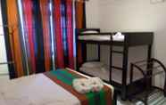 Kamar Tidur 4 Leos Home Stay