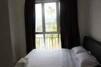 Kamar Tidur Cameron Strawberry Residence