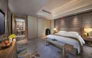 Kamar Tidur 5 Taishan Blossom Hotel