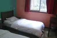 Kamar Tidur Lucky Family Hostel