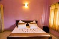 Kamar Tidur Red Stone B&B