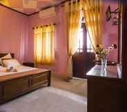 Kamar Tidur 7 Red Stone B&B