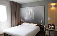Bedroom 2 B&B Hotel Valence TGV - Romans