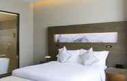 Bedroom 4 Novotel Rizhao Suning