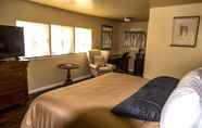 Phòng ngủ 4 Abram Inn & Suites