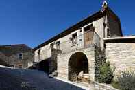 ภายนอกอาคาร Borgotufi Albergo Diffuso