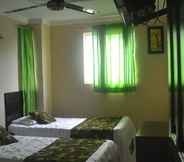 Kamar Tidur 7 Hotel Calarca N1