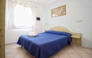 Kamar Tidur 5 Residence Costa del Turchese by PendraHolidays